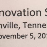 A close up of the words innovation summit