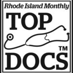 A black and white logo for the top docs