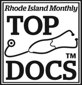 A black and white logo for the top docs
